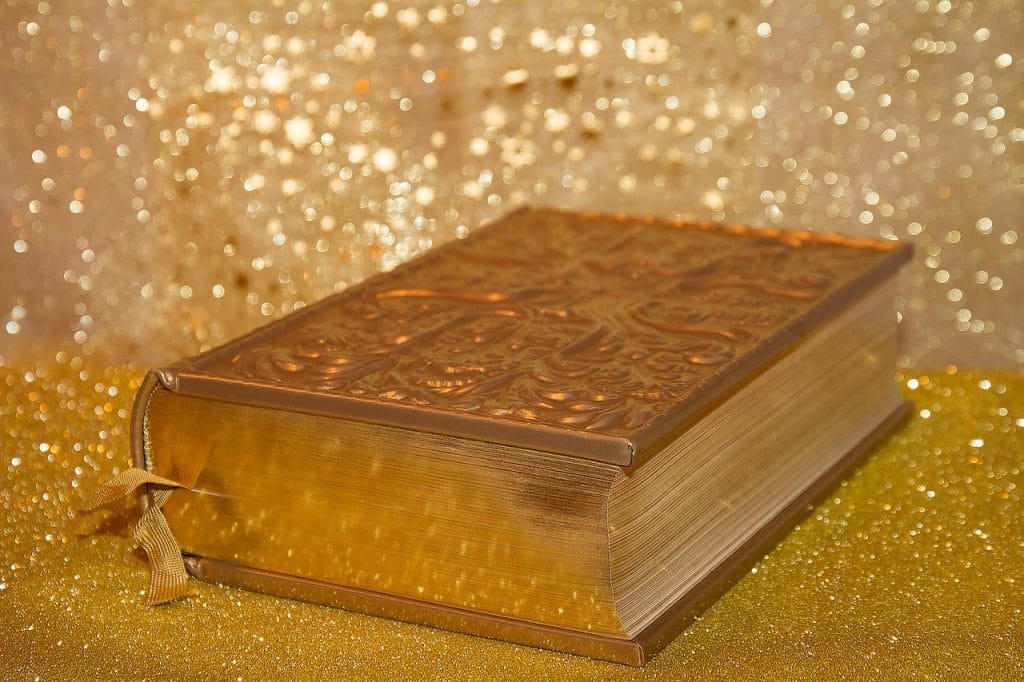 religion of spiritualism Open Bible with soft sunlight, symbolizing faith, prayer, and spiritual guidance.